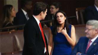 Reps. Matt Gaetz and Alexandria Ocasio-Cortez speak privately on the House floor. | Screenshot/C-SPAN