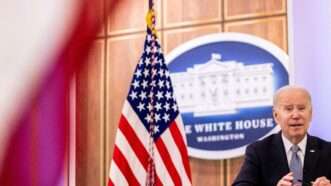 President Joe Biden is seen next to an American flag | Julia Nikhinson - CNP / MEGA / Newscom/RSSIL/Newscom