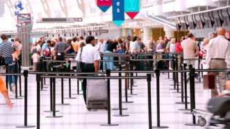 Large check-in line at airport. | Elena Elisseeva | Dreamstime.com