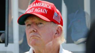 Close up of Donald Trump wearing red MAGA hat on August 14, 2023 | Rich Graessle/Icon Sportswire CGV/Rich Graessle/Icon Sportswire/Newscom