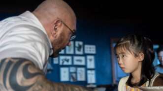 Dave Bautista and Kristen Cui in "Knock at the Cabin" | Universal Pictures