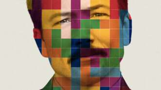 Man's face with the Tetris blocks over it | <em>Tetris</em>/Apple TV+