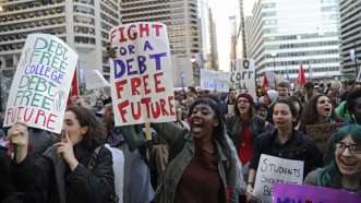 Students protesting student loan debt. | CLEM MURRAY/TNS/Newscom