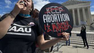 Pro-life protesters in front of the U.S. Supreme Court building | Stephen Shaver/ZUMAPRESS/Newscom