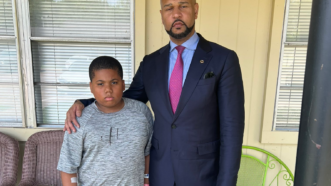 Aderrien Murry with lawyer Carlos Moore | @Esquiremoore/Twitter